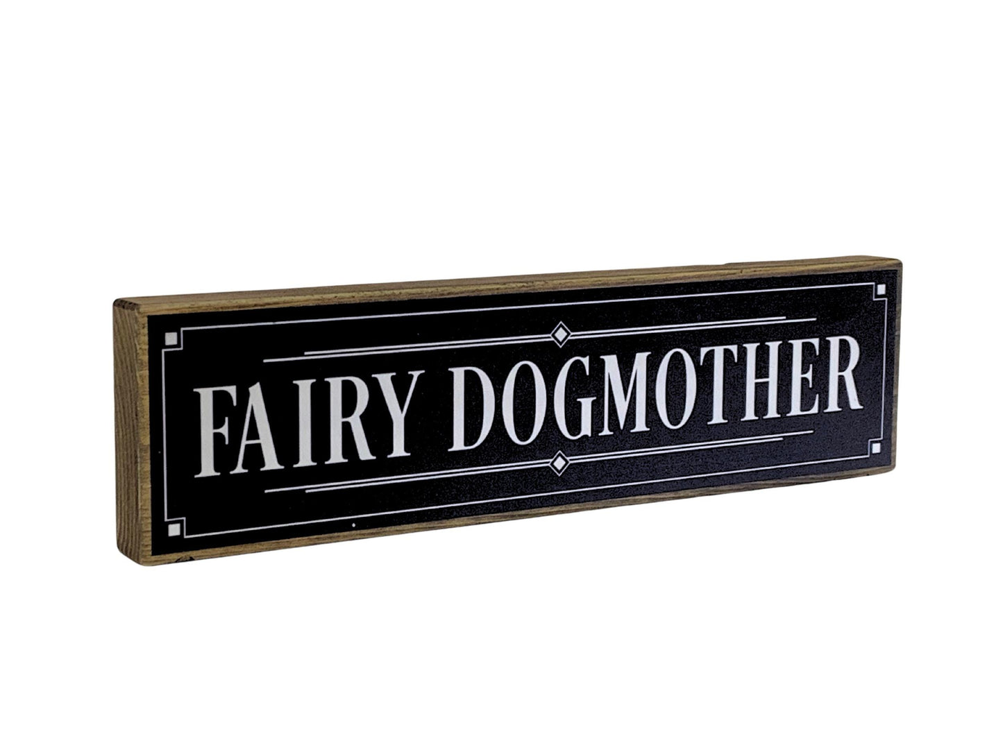 Decorative sign with 'FAIRY DOGMOTHER' text on a white background