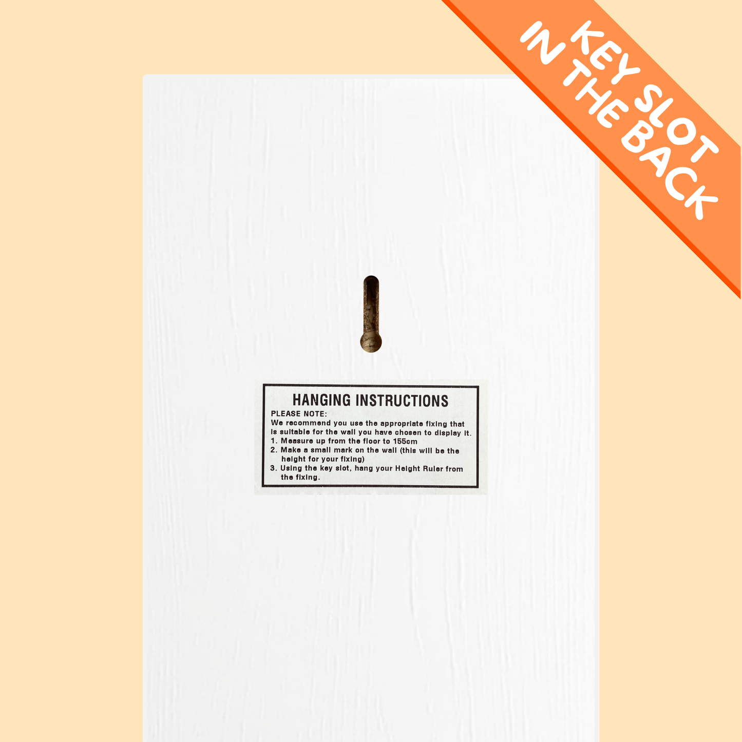 back of the growth chart with Hanging instructions card with a key slot on a beige background