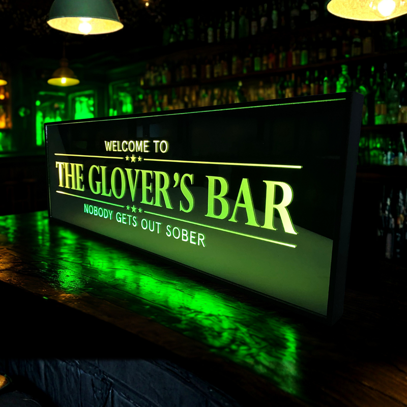 glowing neon sign with led lettering on a moody bar