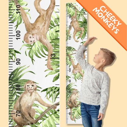 Growth chart with monkey design and a child measuring their height.