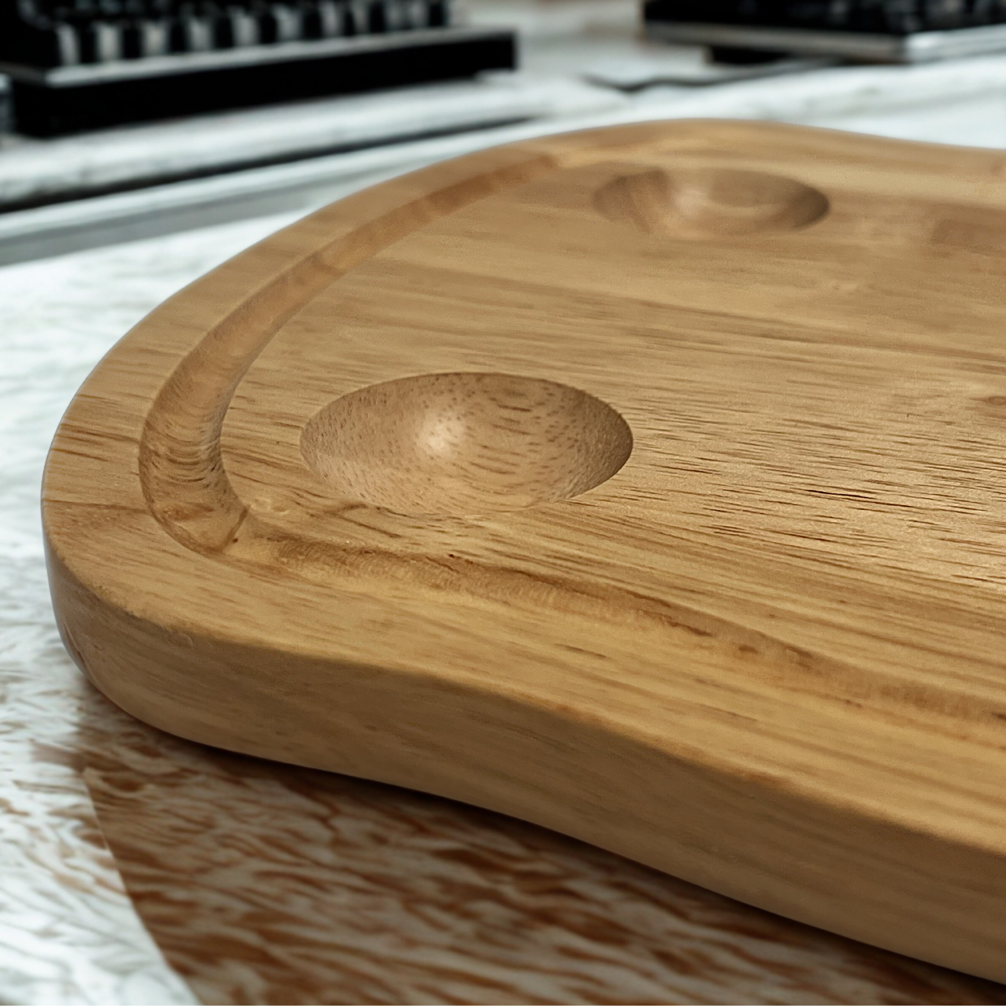 Close up of the egg holders carved into the toast-shaped board with a natural wood grain