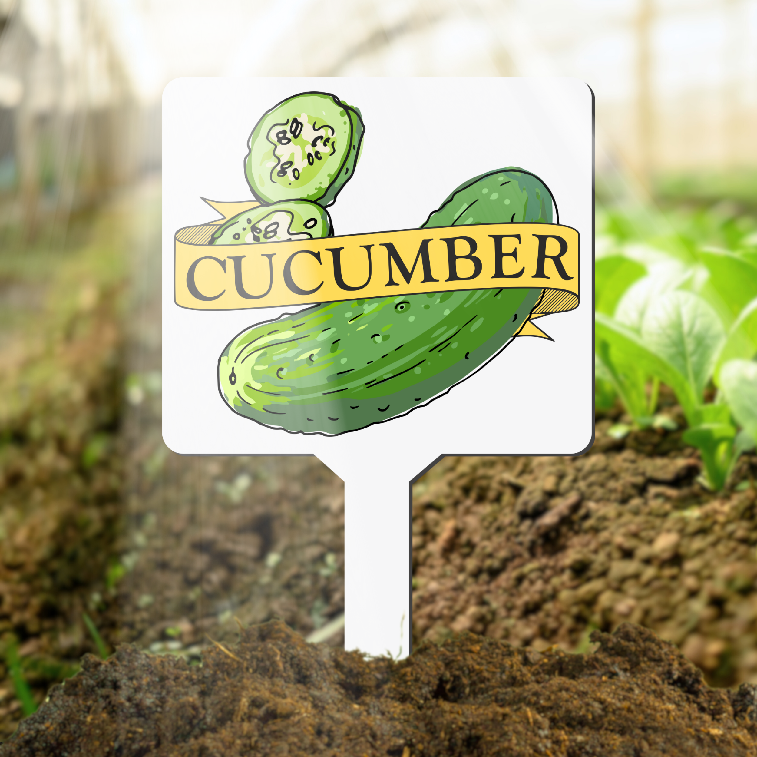 Plant marker with cucumber illustration and label in a garden setting