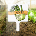 Garden marker with fennel illustration and text in a garden setting