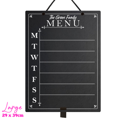 Large chalkboard hanging from black rope with adjustable pen holder at the bottom. Featuring the days of the week printed down the left hand side with sections for each day and the heading 'The Green Family Menu' at the top. The bottom left hand corner reads "Large" with the measurements 29x39cm.