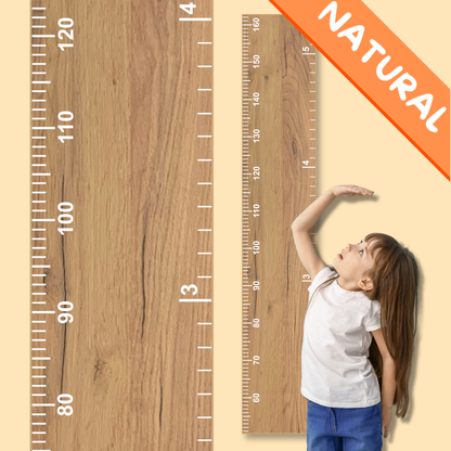 Child measuring their height against a wooden growth chart with 'NATURAL' label.