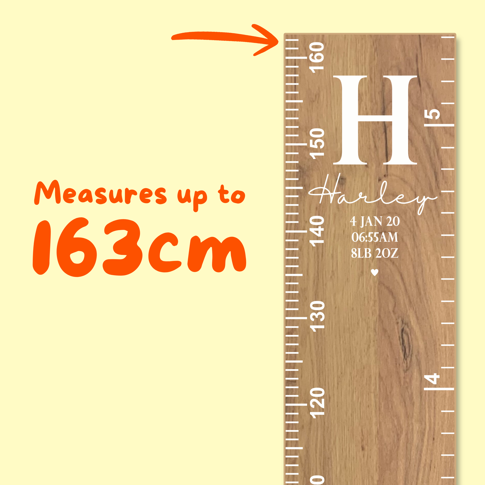 Wooden height chart with measurements up to 163cm on a yellow background