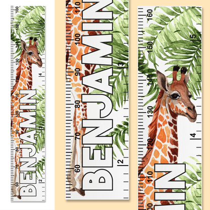 Three growth charts with giraffe designs and personalised name up the center on a beige background