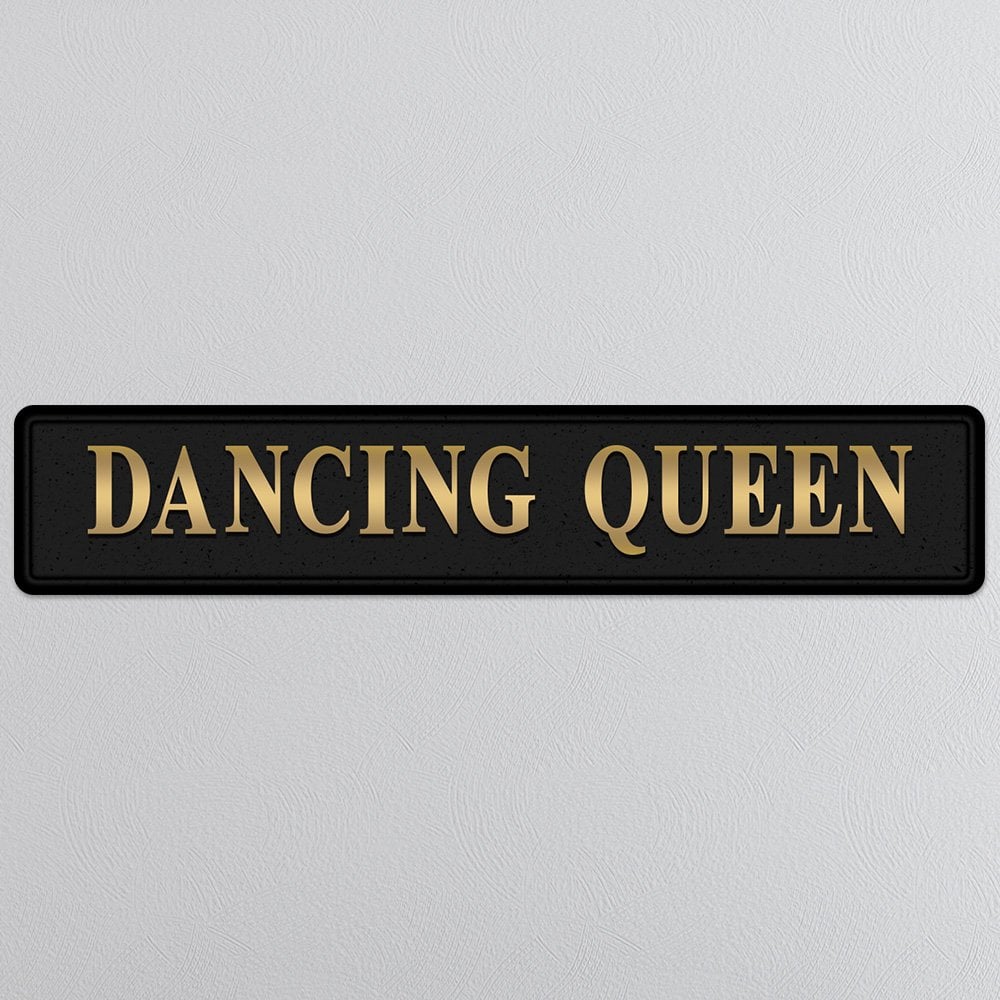 Black and gold foiled street sign with 'Dancing Queen' wording