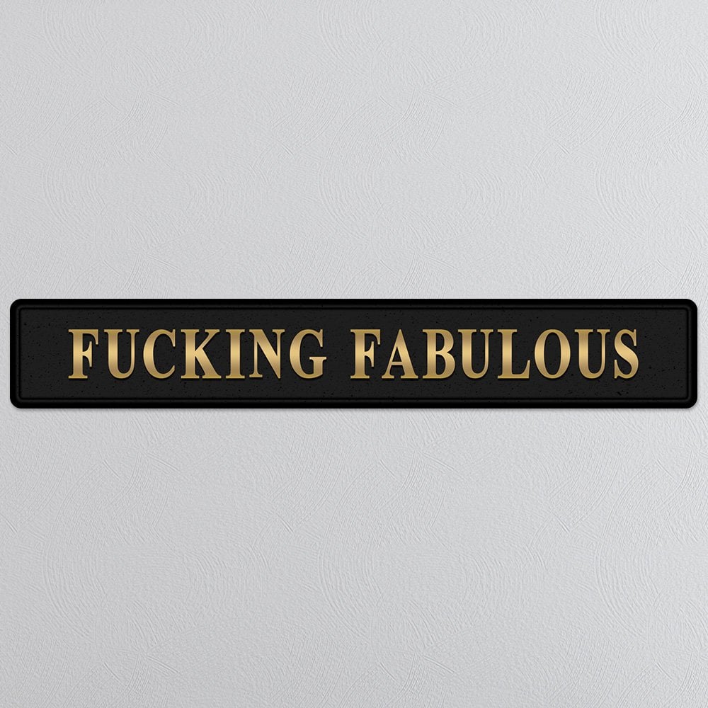 Black and gold foiled wooden street sign with 'Fucking Fabulous' wording