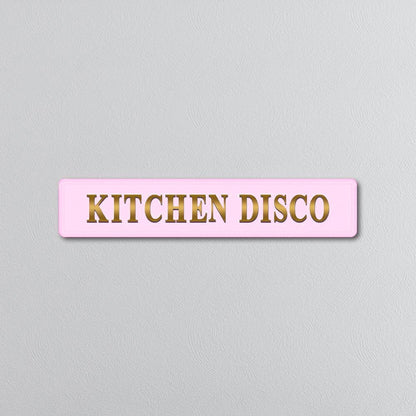 Pink and gold foiled street sign with 'Kitchen disco' wording