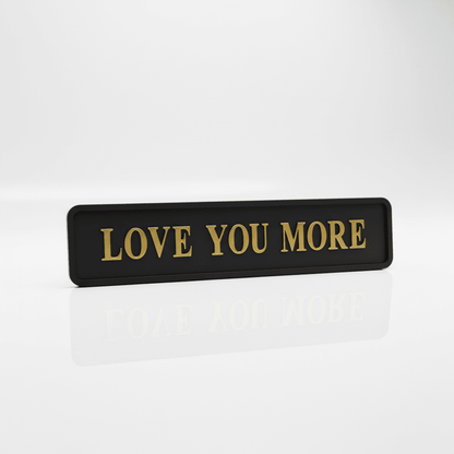 Black with gold foiled street sigh with "love you more" wording 