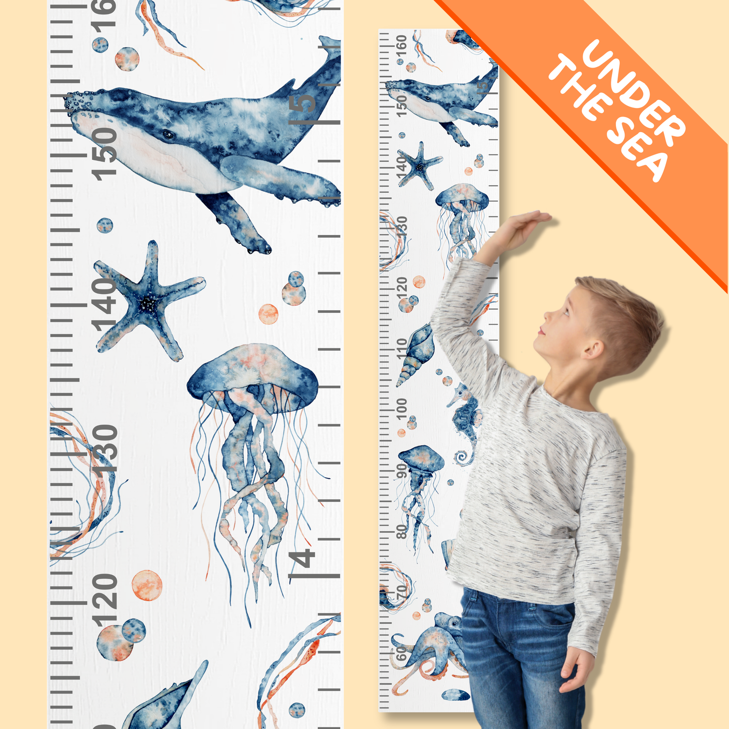 Height chart with under-the-sea design featuring watercolour sea creatures and a child standing next to it.