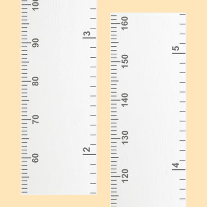 Growth ruler on a beige background with measurement markings