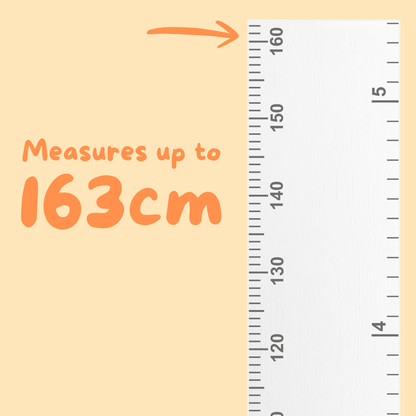 Ruler on a yellow background with text indicating measurement capacity
