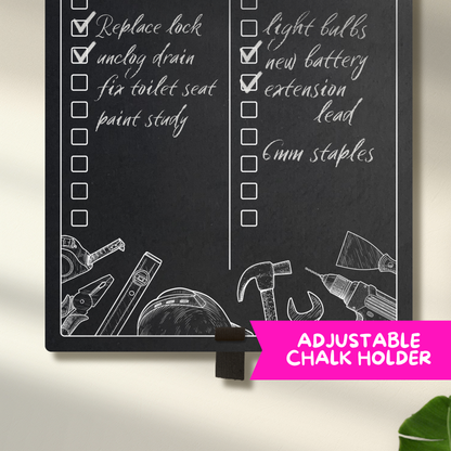 Close up of a chalkboard, featuring sketchy tool illustrations printed along the bottom with an elastic pen holder.