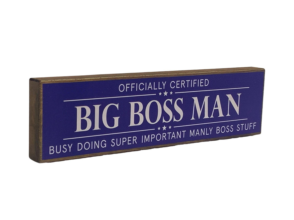 Wooden sign with text 'Big Boss Man' on a blue background