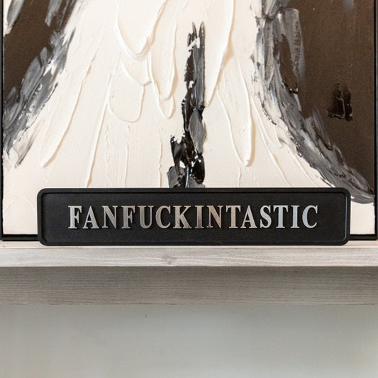 Black and silver foiled street sign with 'fanfuckintastic' wording
